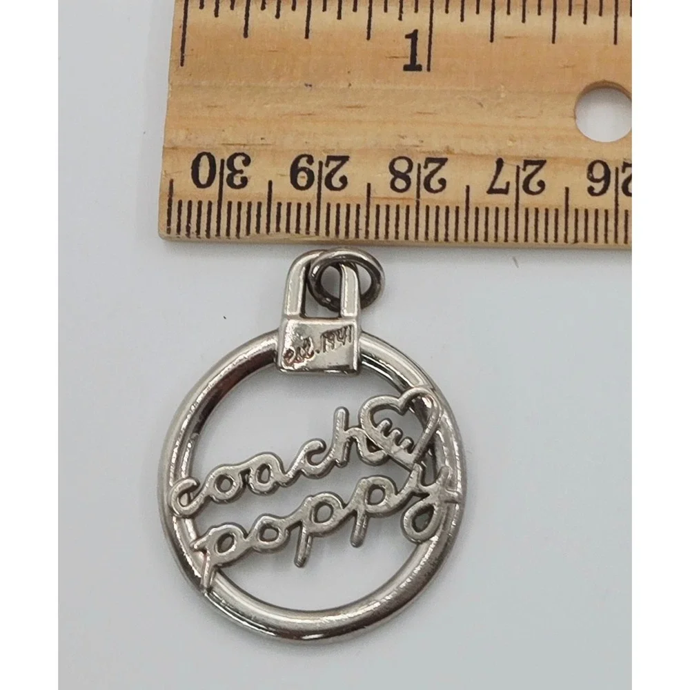 Coach Silver Metal Round Disc 